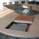 Table pour salle de réunion avec rangements intégrés - Menuiserie Agencement Général 44 à Nantes (44)